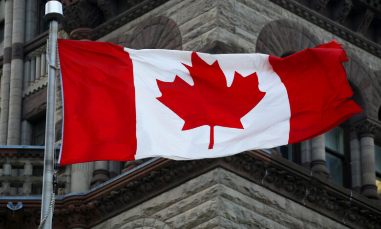 canada flag in the wind on parliament