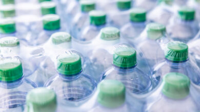 Packaging of plastic bottles with mineral water - Close up.
