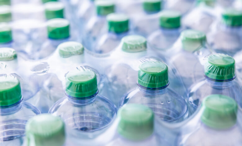Packaging of plastic bottles with mineral water - Close up.